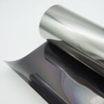 Tamsi veidrodinio tamsaus sidabrinio atspalvio plėvelė, šviesos laidumas 10%