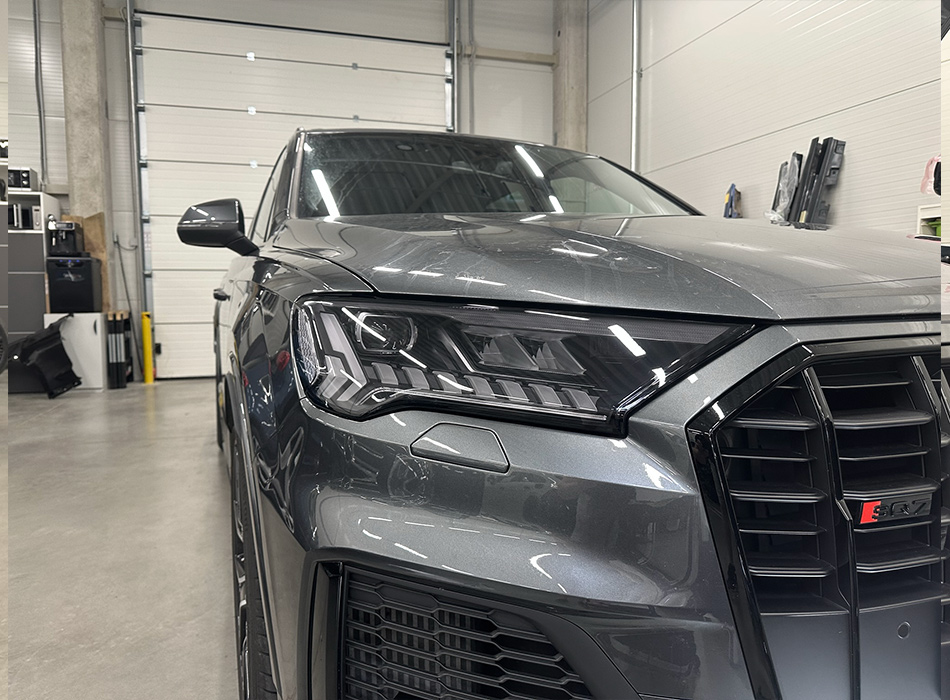 Audi Q7 priekiniai žibintai apklijuoti H70 light grey plėvele